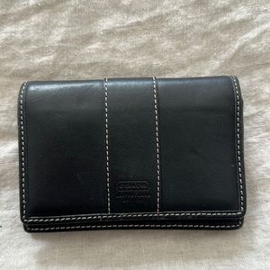 Black leather Coach wallet.